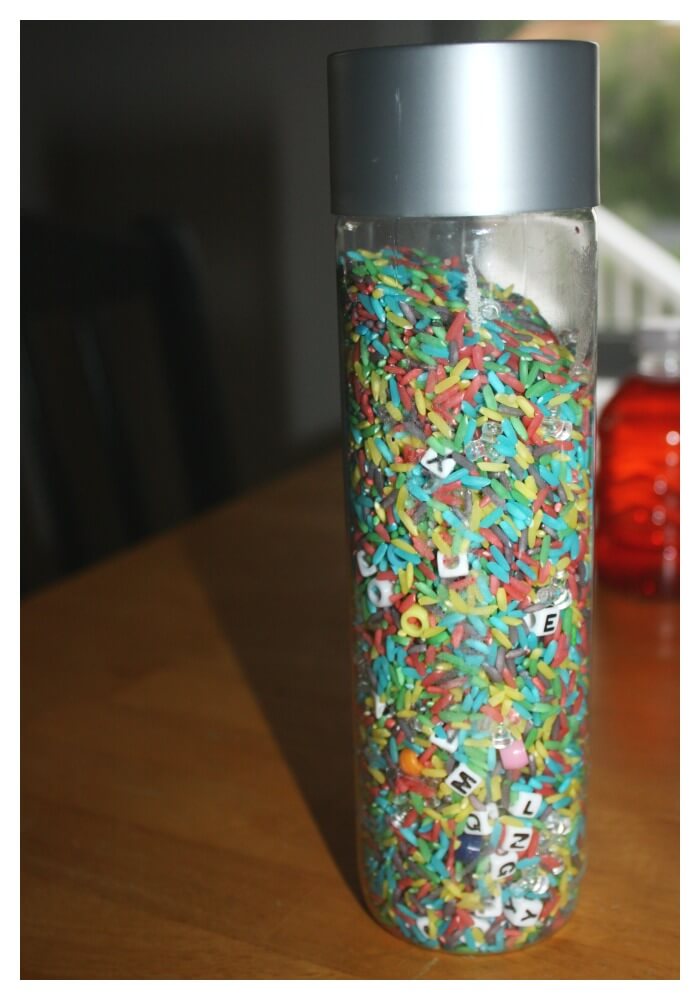 recycled sensory bottles rainbow rice alphabet sensory bottle