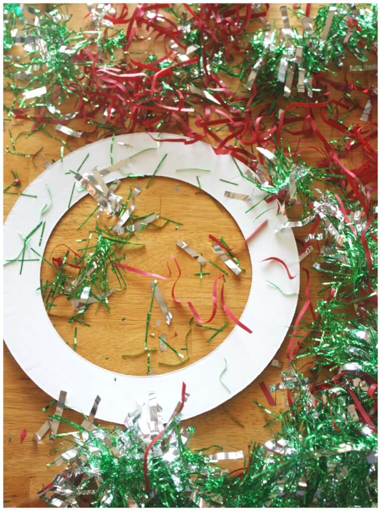 Christmas wreathe craft activity cardboard ring garland set up