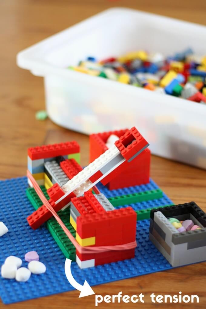 Build a kids Easy LEGO catapult and marshmallow launcher for a simple STEM activity