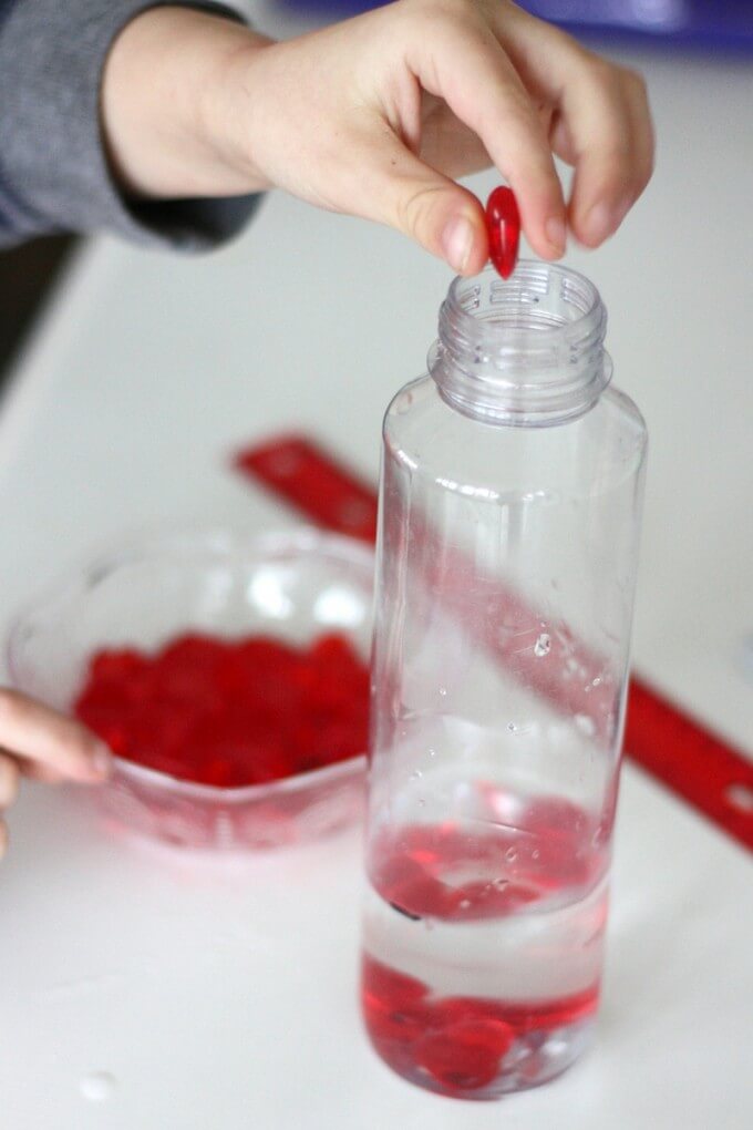 Valentines Day Water Displacement Science with plastic hearts
