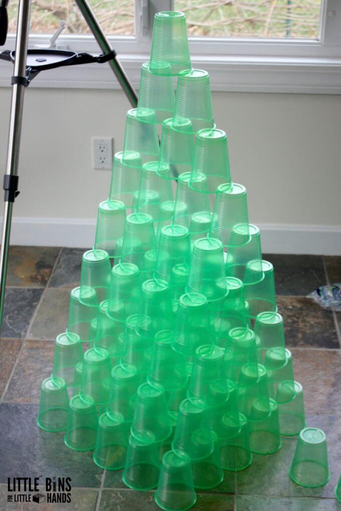 This Christmas cup tower STEM is a great science experiment for kids! One of the simplest experiments for kids to try this holiday season! 