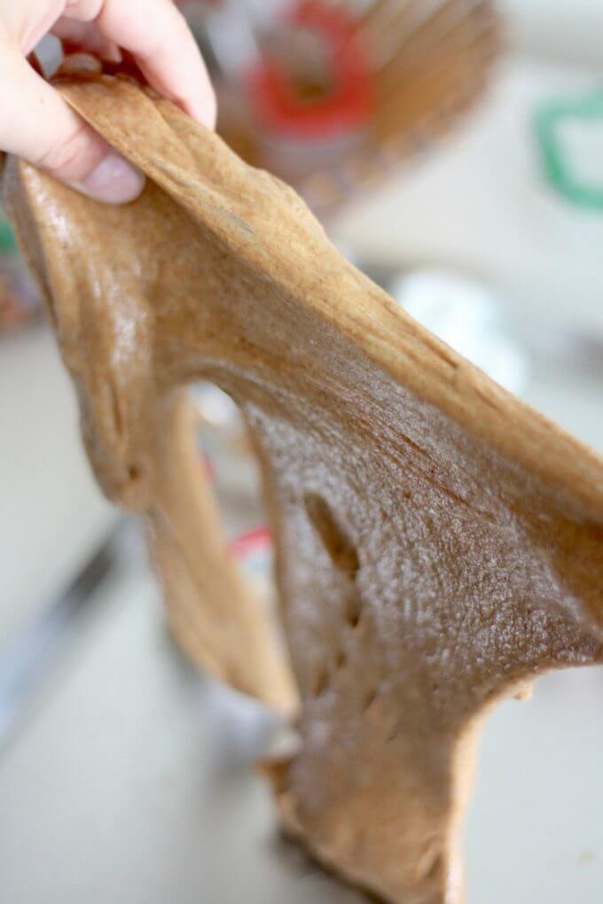 Stretchy scented gingerbread slime Christmas activity for kids.