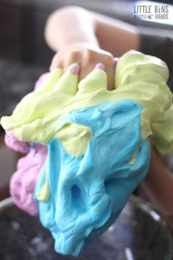 holding fluffy slime in hands