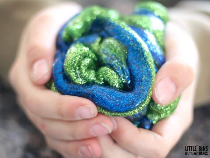A handful of Earth Day slime for a cool Earth Day themed chemistry activity.