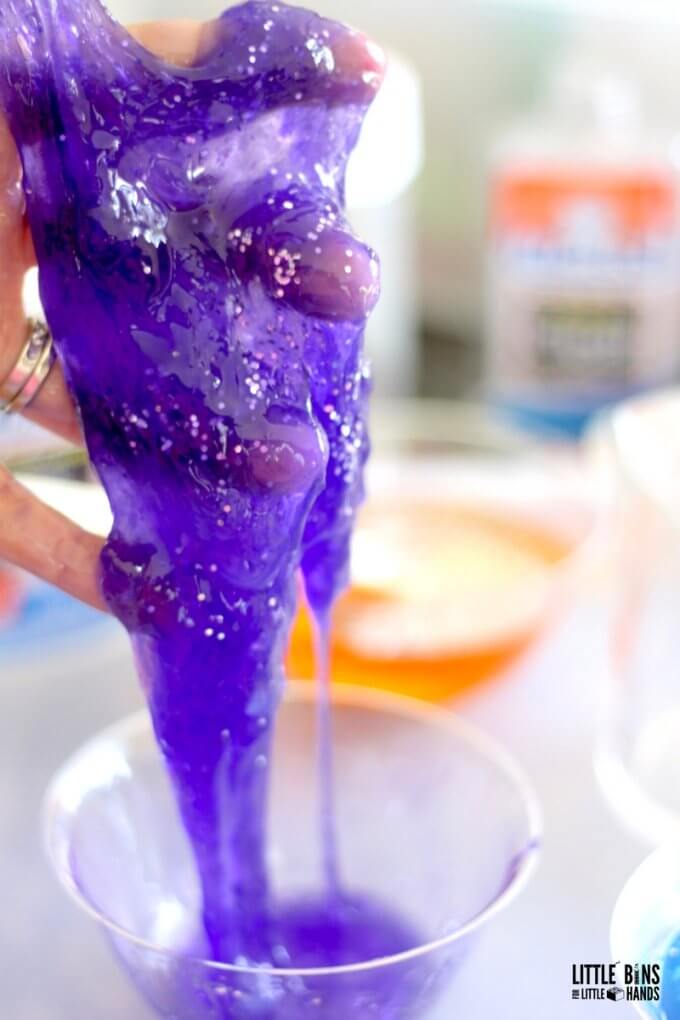 Clear glue slime recipe with purple food coloring to make galaxy slime