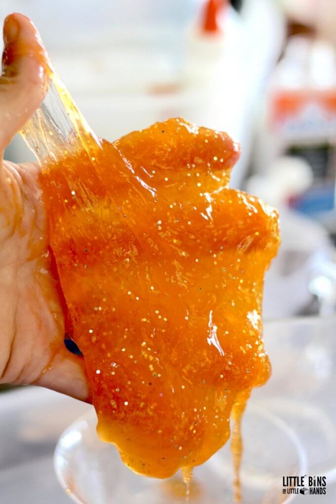 Orange clear glue and glitter slime recipe for galaxy slime