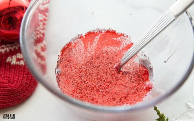 Making christmas slime recipe with tinsel glitter - Christmas science fun for kids