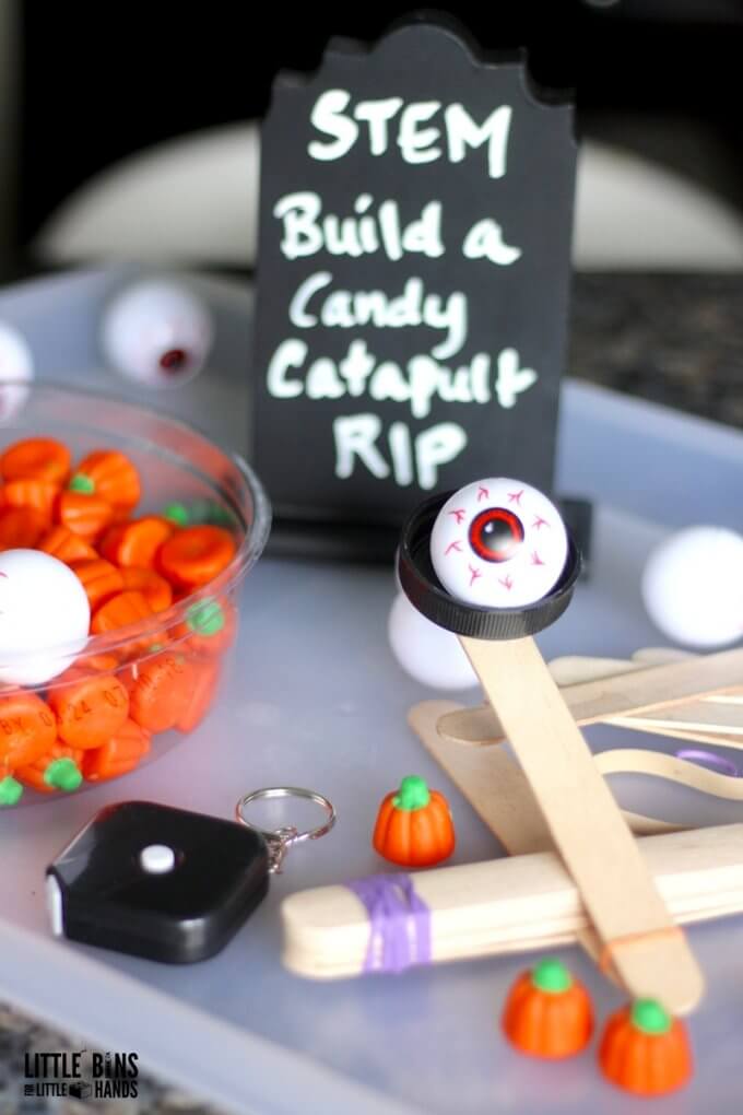 Explore science, engineering, math and history with an easy Halloween popsicle stick STEM activity 