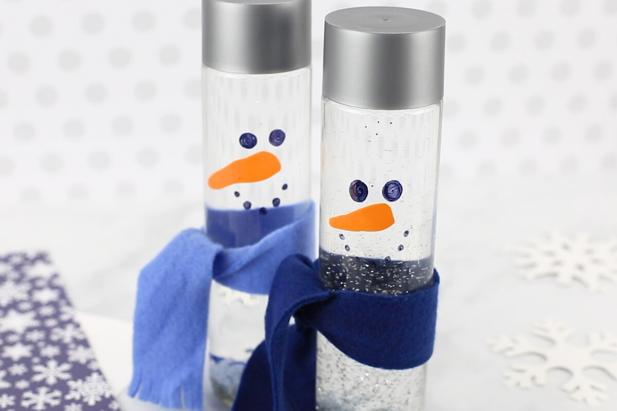snowman sensory bottles with scarves