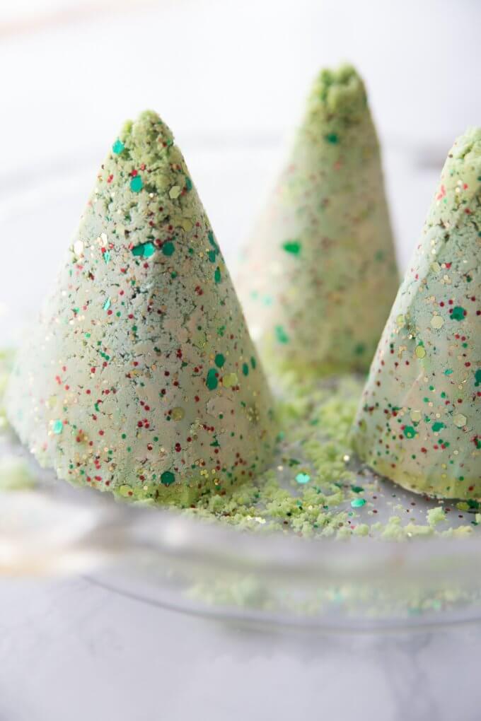 frozen fizzy Christmas trees made from baking soda ready to be melted