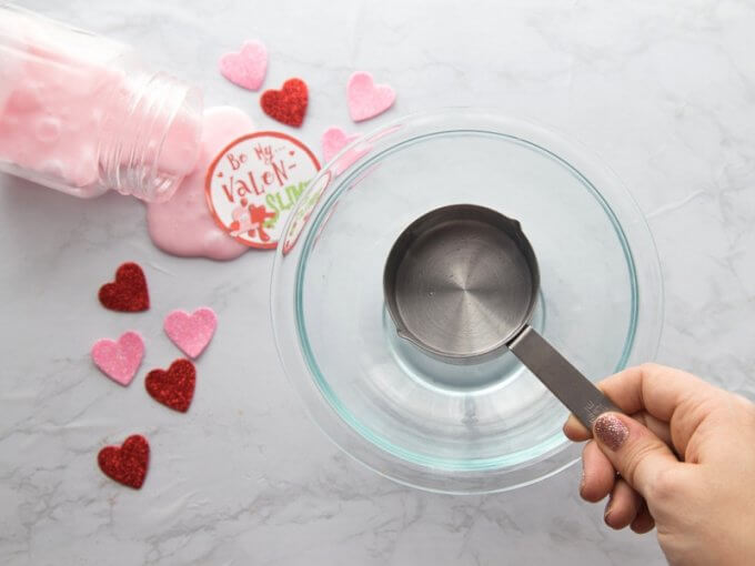 Mix glue and water together for Valentines Day slime