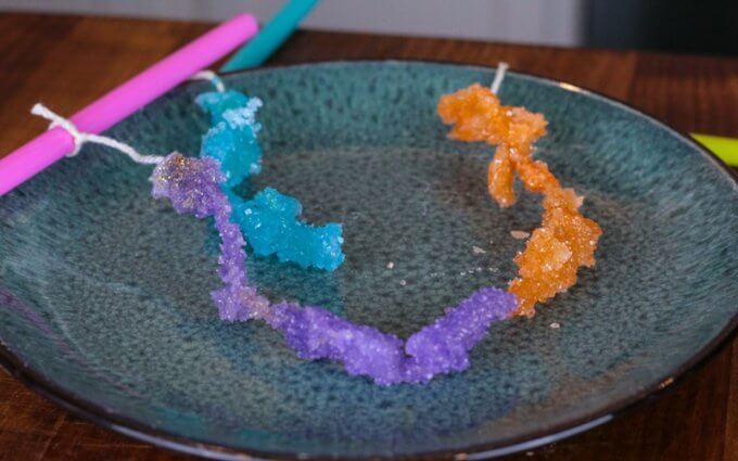 formed sugar crystals out of water and on plate