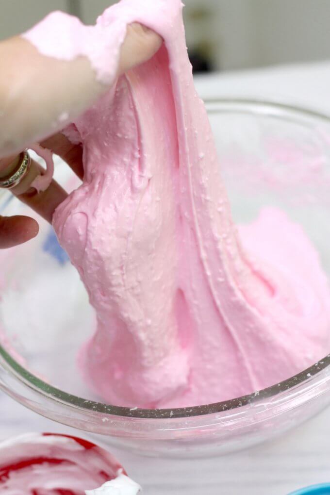 mixing fluffy cotton candy scented slime recipe in bowl