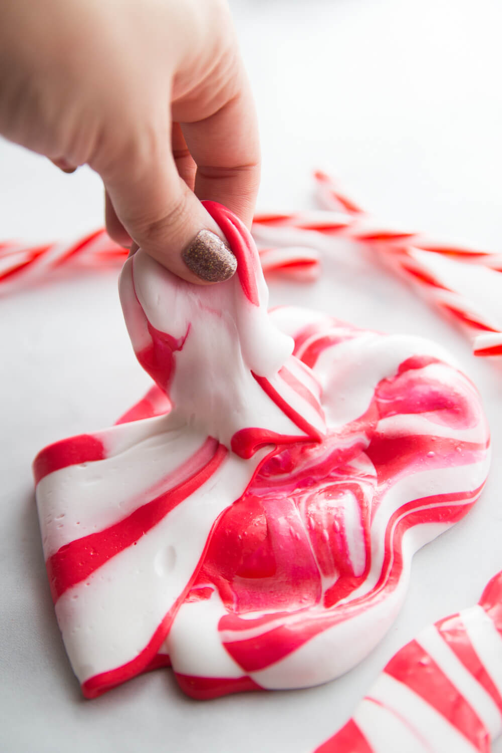 Candy cane butter slime with a red and white twist