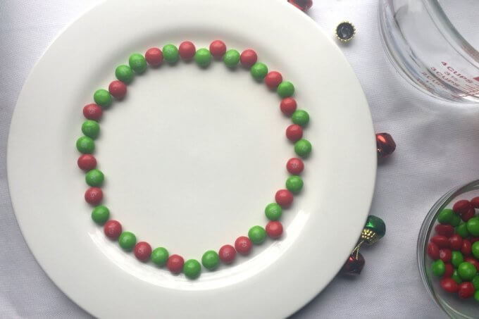 Arranging a skittles pattern on a plate to learn about water stratification