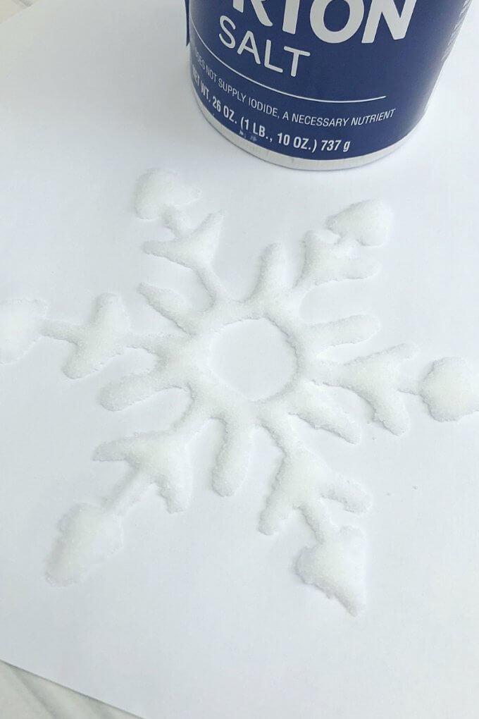 salt covered glue snowflake for salt painting winter science