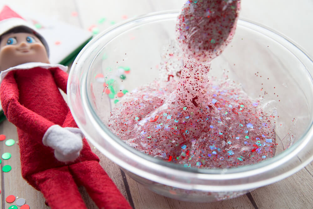 Elf on the shelf Christmas confetti slime with clear glue in bowl