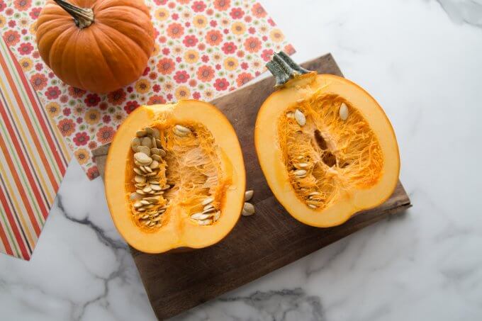 pumpkin cut on - shows stem pulp and seeds