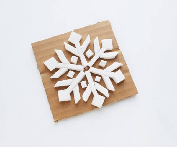 Fun Stamping Snowflake Craft - Little Bins for Little Hands