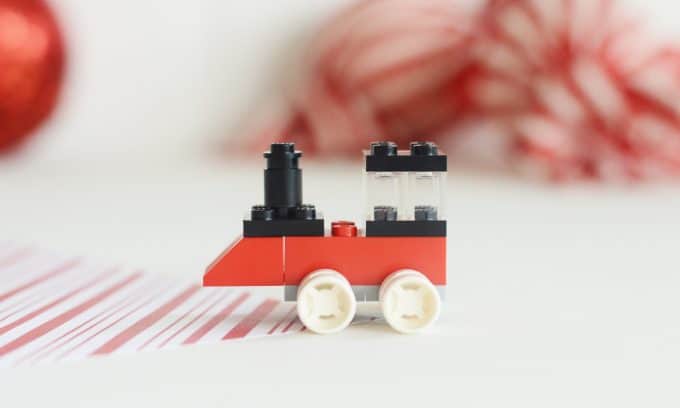 A toy train made out of legos.