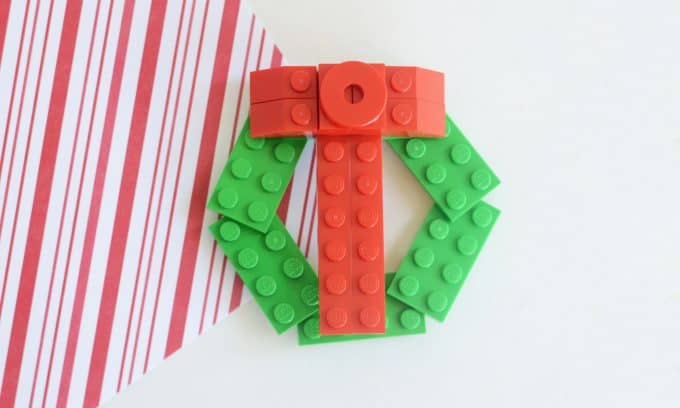 A Christmas wreath made out of Legos.