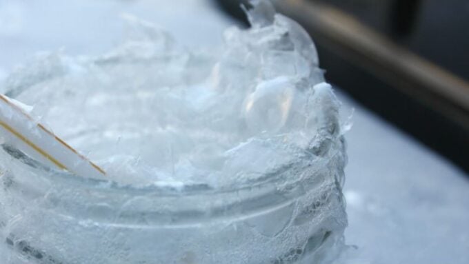 Freezing bubbles winter science experiment showing ice crystals forming on soap bubbles