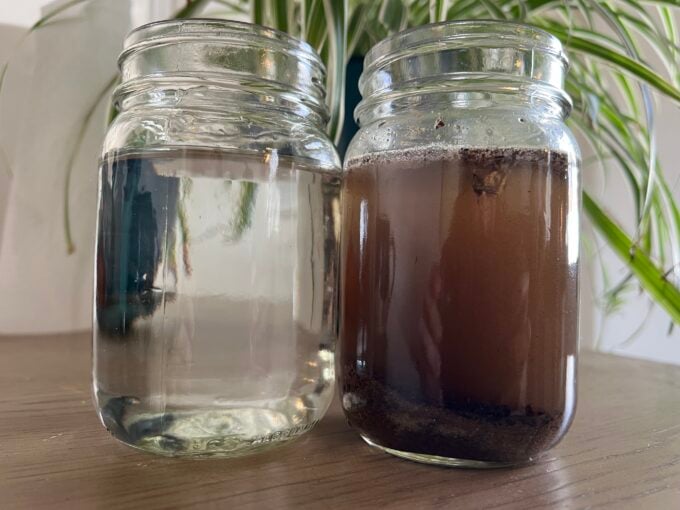 dirt settling at bottom of water during experiment