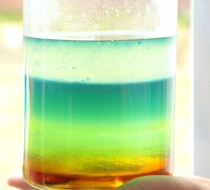 Colorful density tower experiment with layered liquids