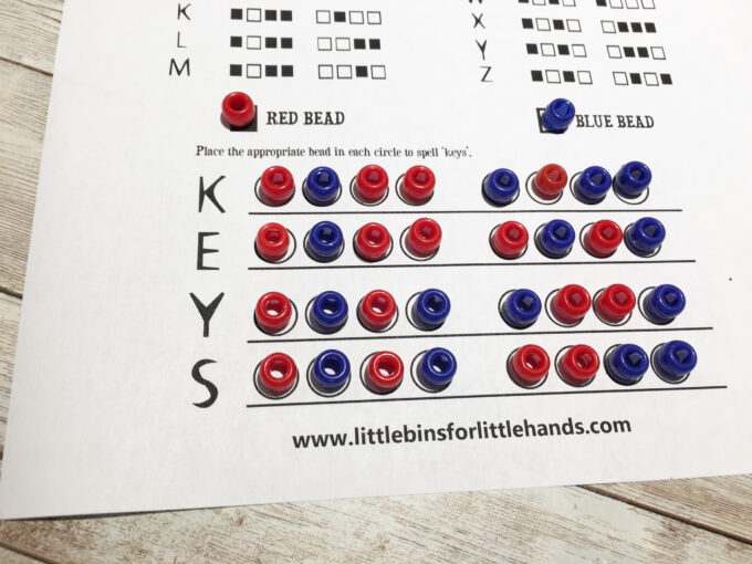 showing beads representing 1s and 0s for binary code